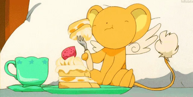 Kero from Card Captors Sakura eating cake 